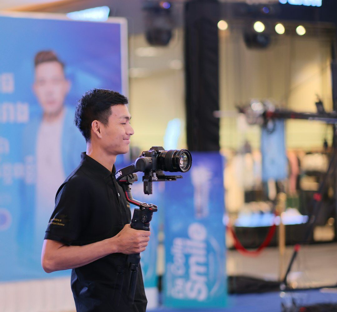Senior male videographer and technical director