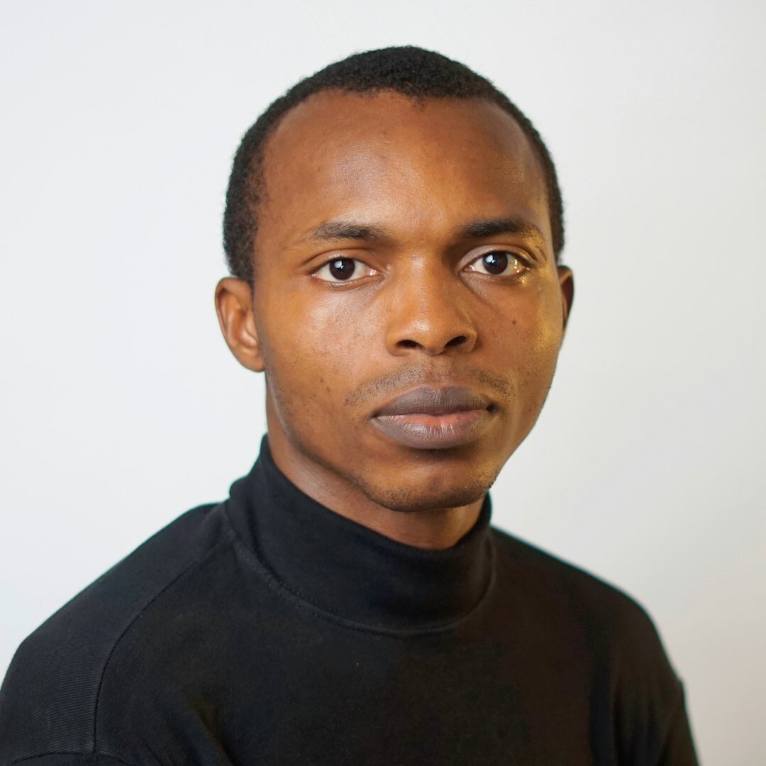 Professional male camera instructor in a studio setting