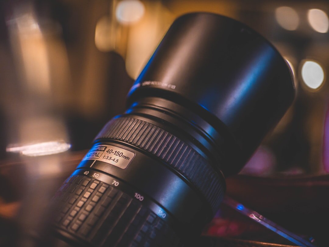 Professional camera lens with bokeh background blur effect